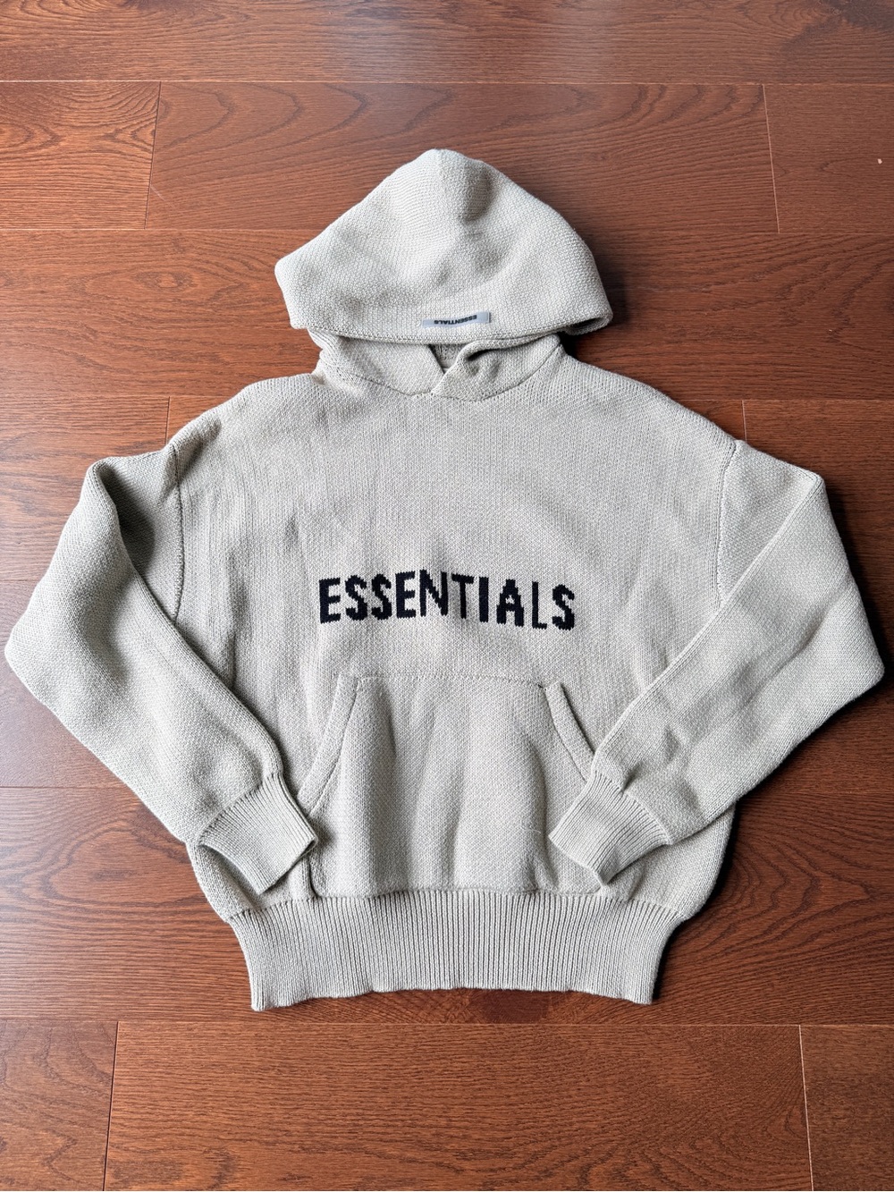 Fear of God ESSENTIALS Hooded Sweater in Light Beige with Black Logo